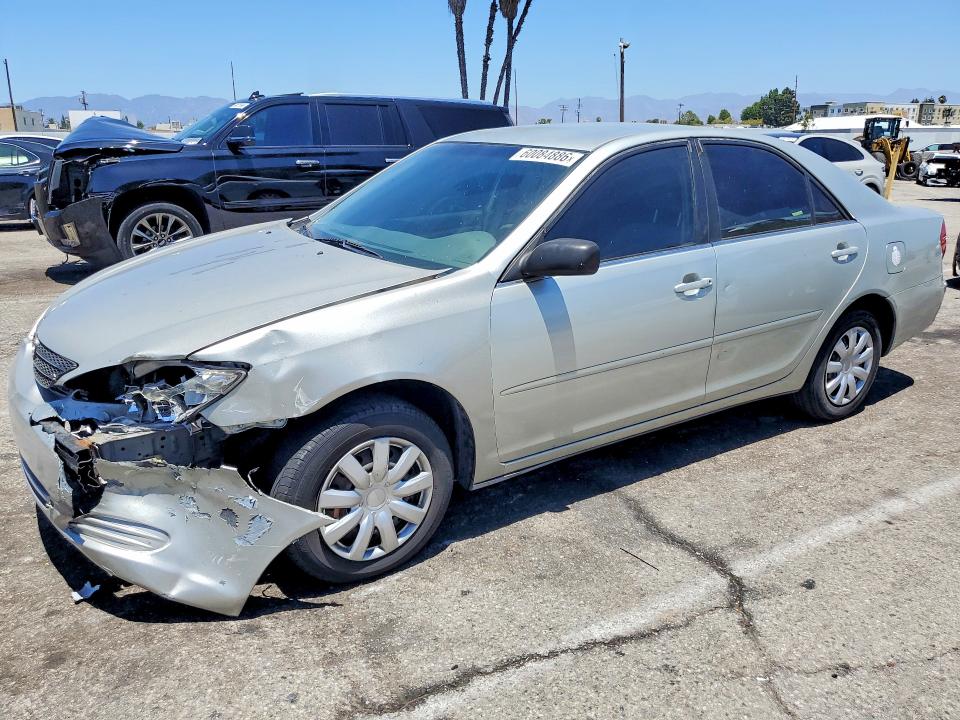 TOYOTA CAMRY 2002 with VIN JTDBE32K720038502 - Photo from auction