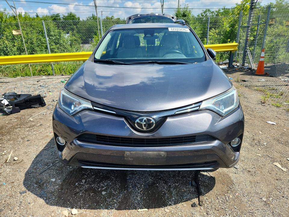 Photo 5 from auction – 2018 TOYOTA RAV4 with VIN JTMRFREV4JJ720234