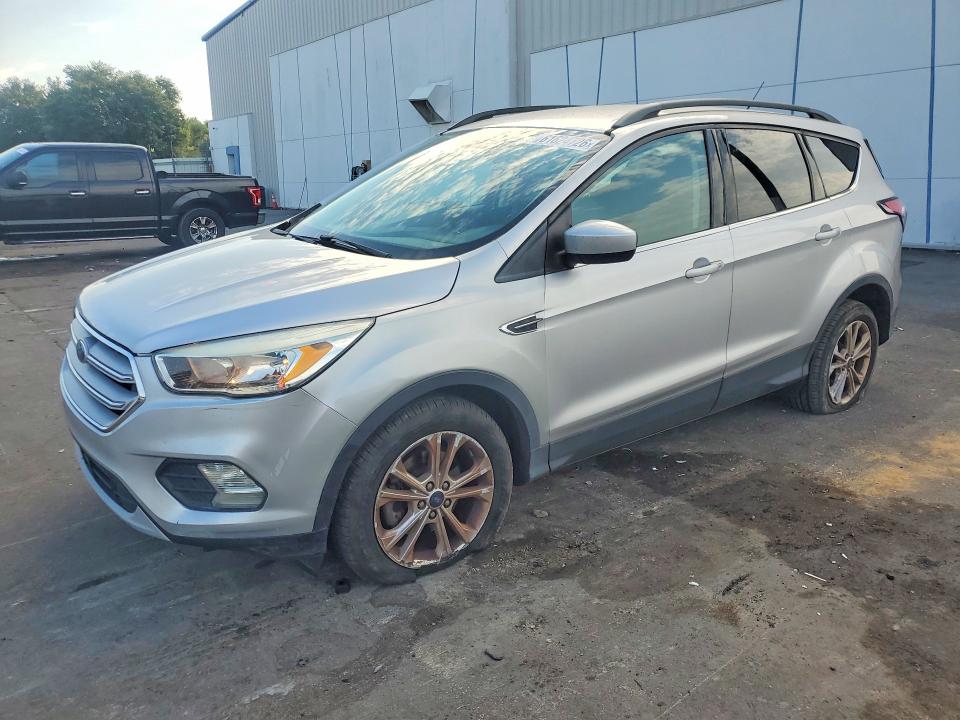 FORD ESCAPE 2018 with VIN 1FMCU0GD0JUA75183 - Photo from auction