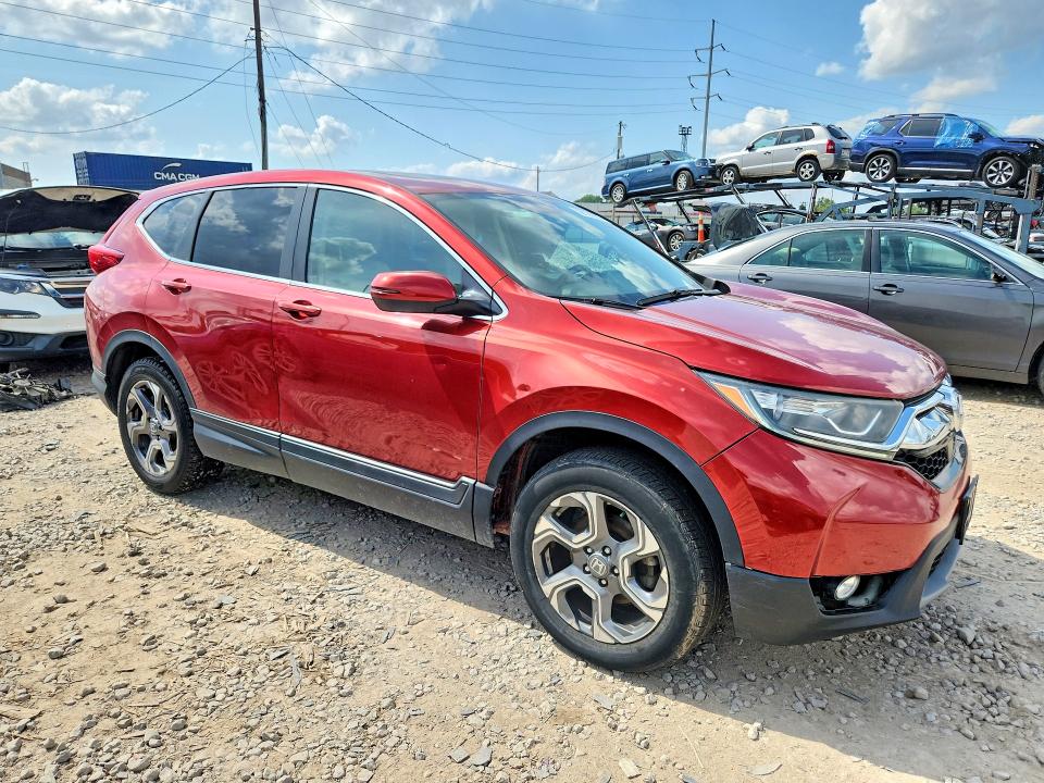 Photo 4 from auction – 2019 HONDA CR-V with VIN 2HKRW2H58KH604550