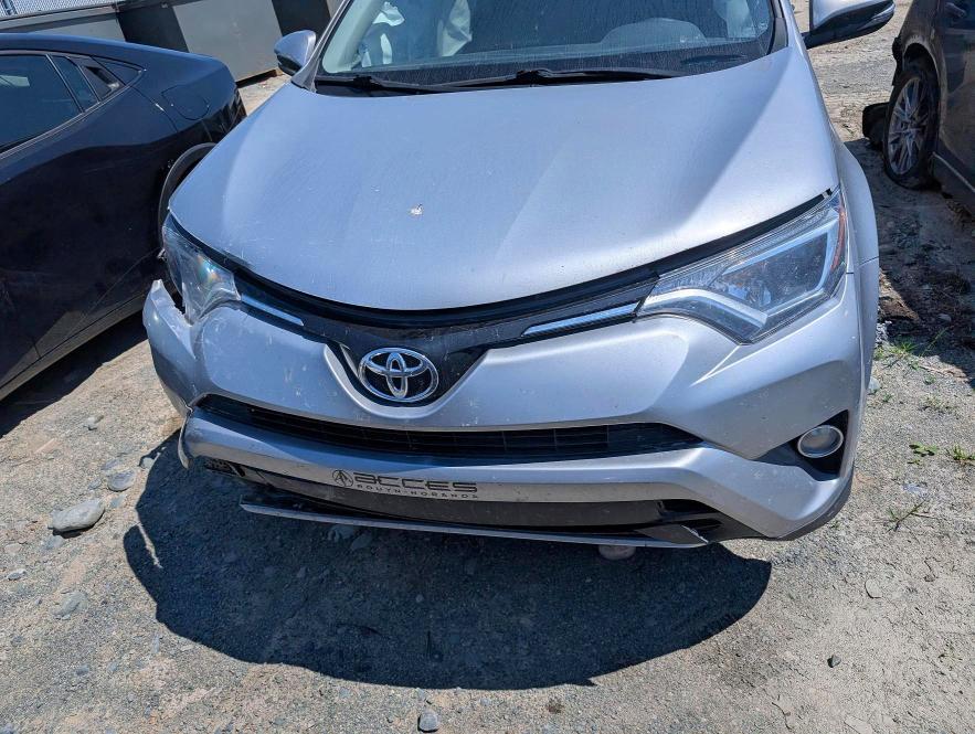 Photo 5 from auction – 2016 TOYOTA RAV4 with VIN 2T3RFREV8GW513694