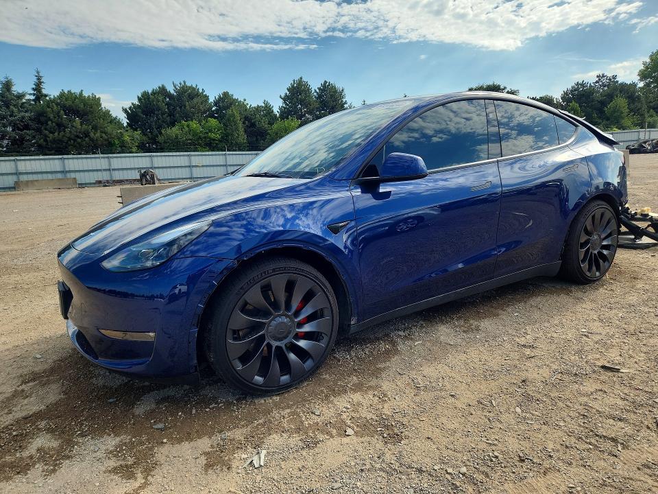 TESLA MODEL Y 2023 con VIN 7SAYGDEF6PF826708 - Foto de la subasta