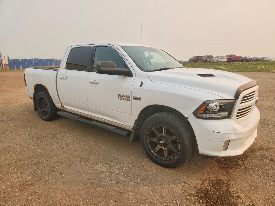 Photo 4 from auction – 2013 RAM 1500 with VIN 1C6RR7MT0DS623307
