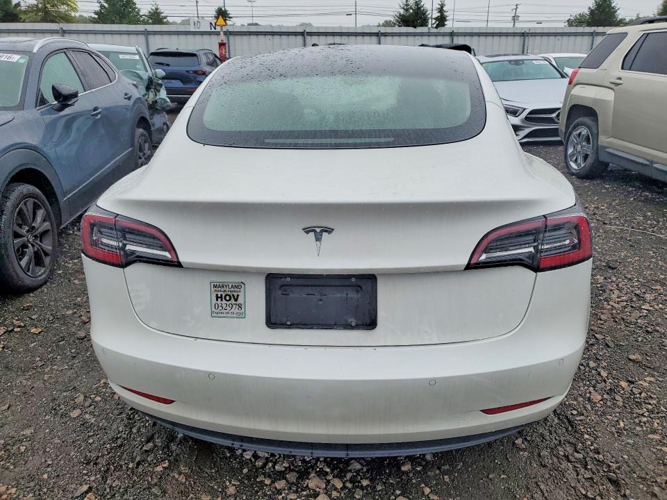 Photo 6 from auction – 2021 TESLA MODEL 3 with VIN 5YJ3E1EA0MF059076