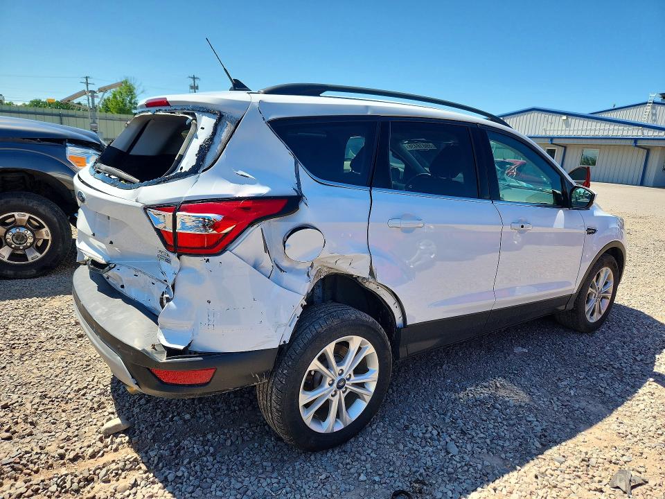 Photo 3 from auction – 2019 FORD ESCAPE with VIN 1FMCU9HD9KUA43837