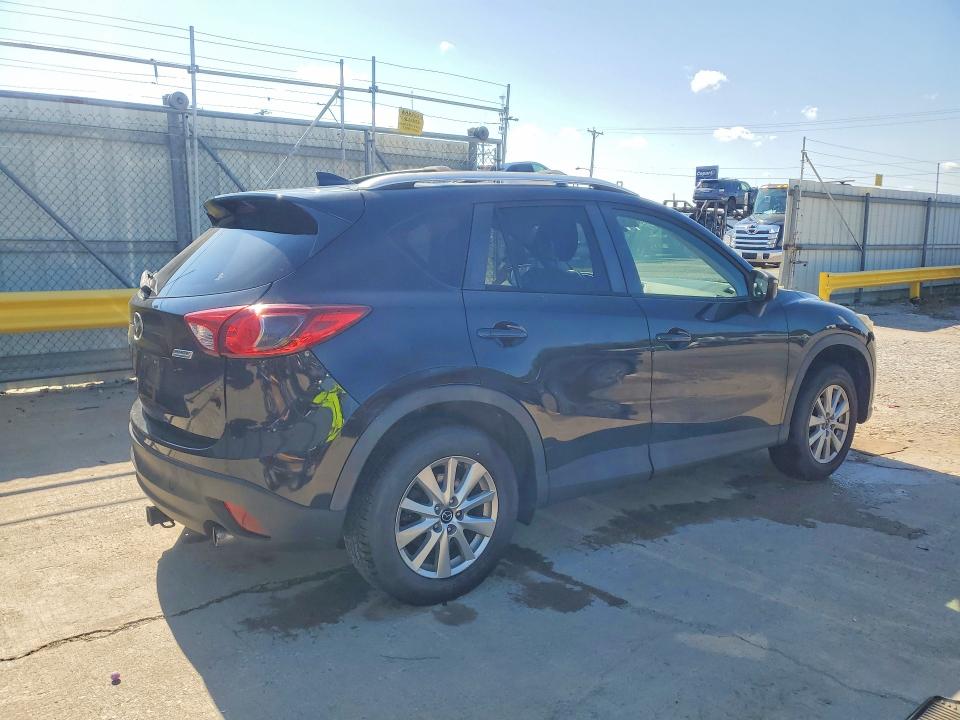 Photo 3 from auction – 2016 MAZDA CX-5 with VIN JM3KE4CY9G0675303