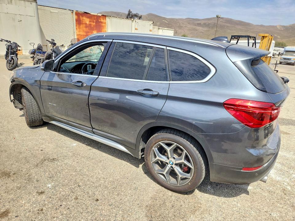 Photo 2 from auction – 2018 BMW X1 with VIN WBXHU7C37J5H39575