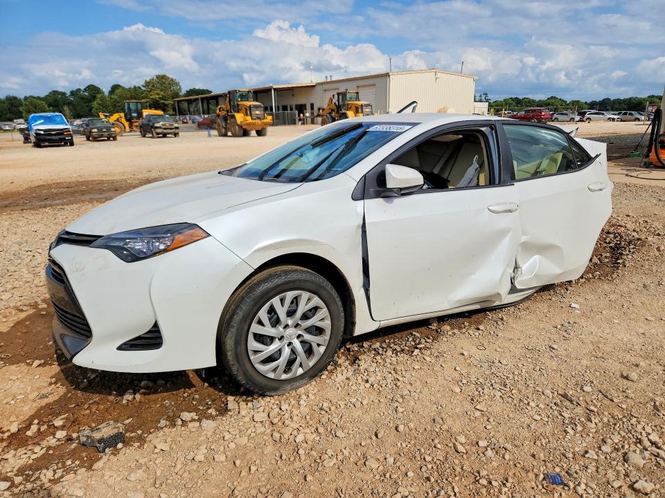 TOYOTA COROLLA 2017 with VIN 5YFBURHE5HP574807 - Photo from auction