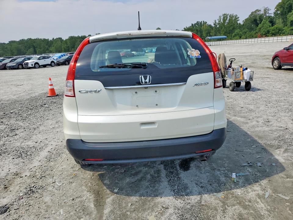 Photo 6 from auction – 2014 HONDA CR-V with VIN 5J6RM4H3XEL105968