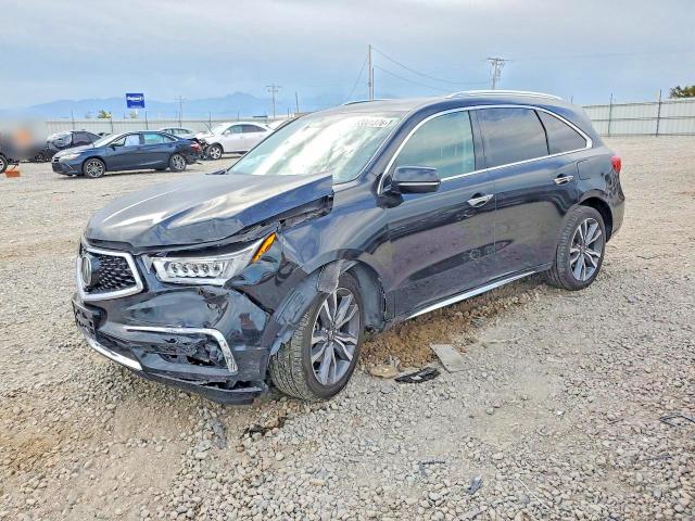 ACURA MDX 2019 with VIN 5J8YD4H90KL005574 - Photo from auction