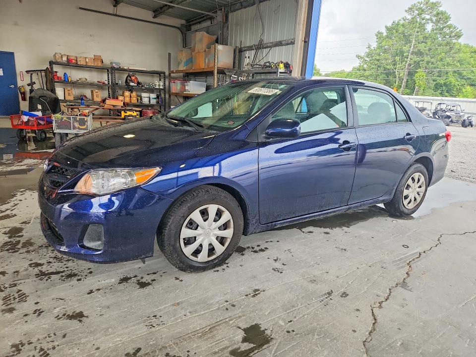 TOYOTA COROLLA 2011 with VIN 2T1BU4EEXBC687490 - Photo from auction