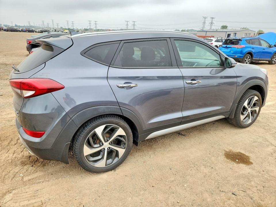 Photo 3 from auction – 2017 HYUNDAI TUCSON with VIN KM8J3CA25HU364833