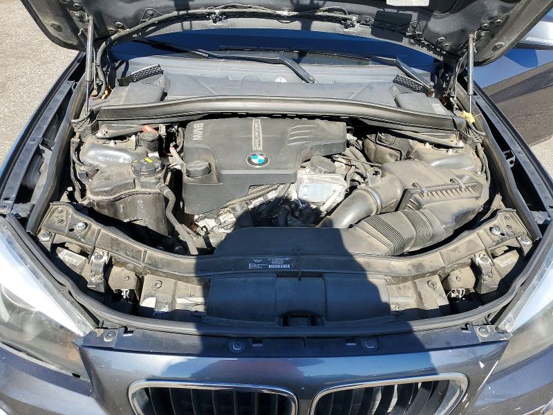 Photo 11 from auction – 2015 BMW X1 with VIN WBAVM1C50FV317017