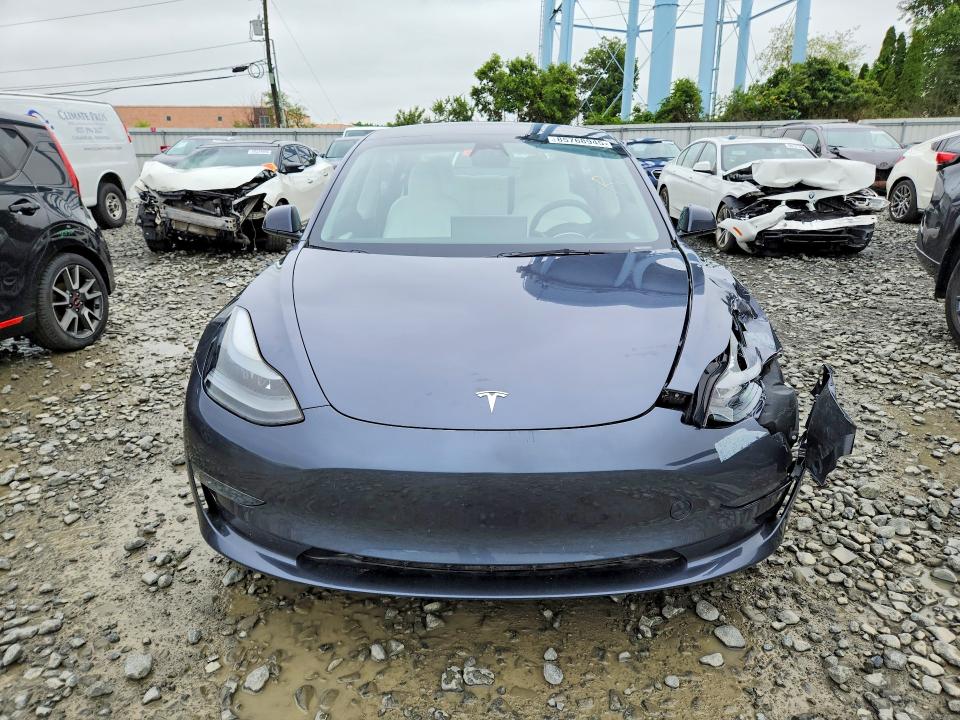 Photo 5 from auction – 2023 TESLA MODEL 3 with VIN 5YJ3E1EB3PF663900