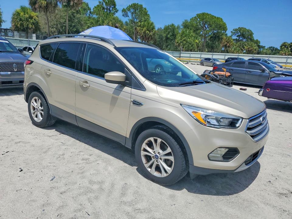 Photo 4 from auction – 2018 FORD ESCAPE with VIN 1FMCU0GD0JUC67431