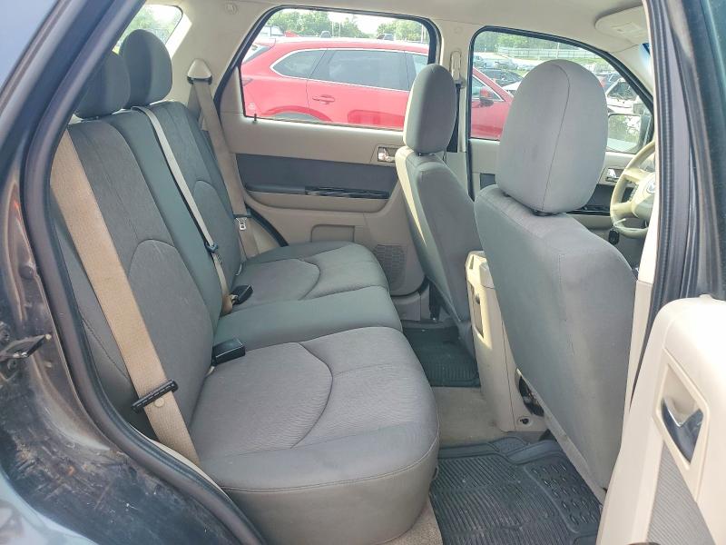 Photo 11 from auction – 2010 MAZDA TRIBUTE with VIN 4F2CY0C76AKM02111