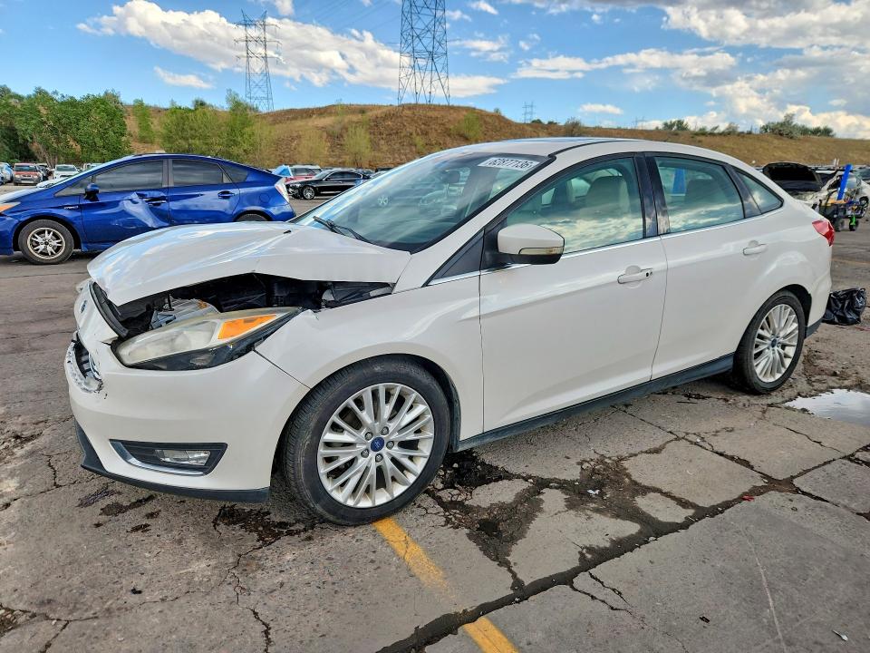 FORD FOCUS 2017 with VIN 1FADP3J29HL272657 - Photo from auction