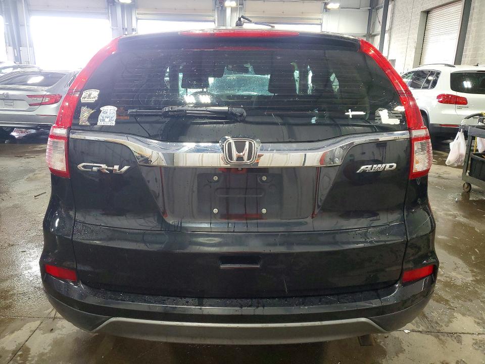 Photo 6 from auction – 2016 HONDA CR-V with VIN 5J6RM4H39GL105933