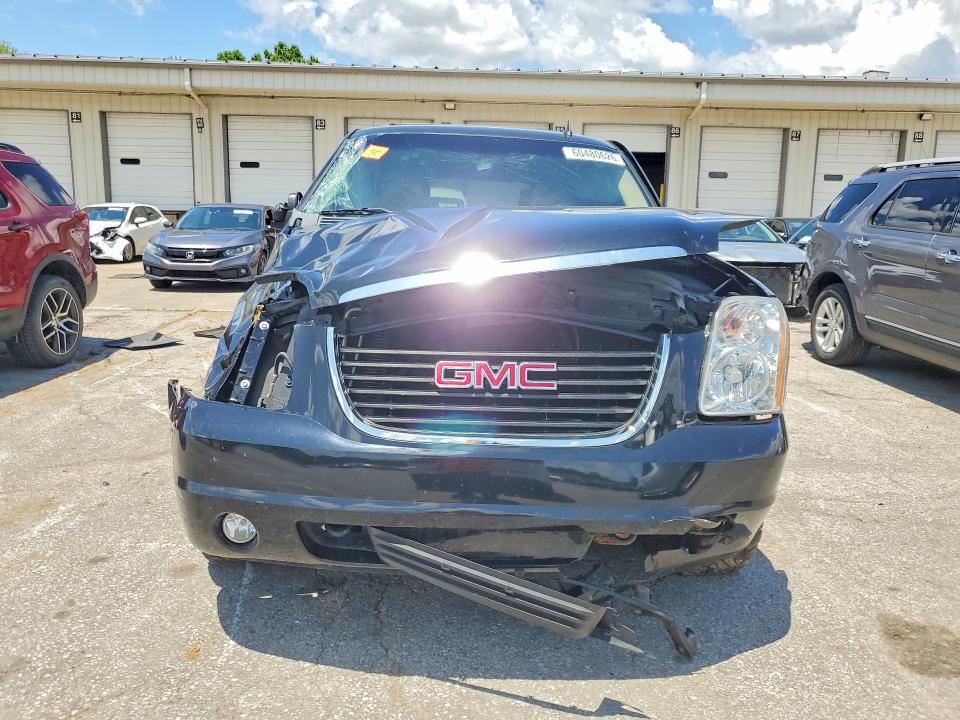 Photo 5 from auction – 2009 GMC YUKON with VIN 1GKFK33009R297351