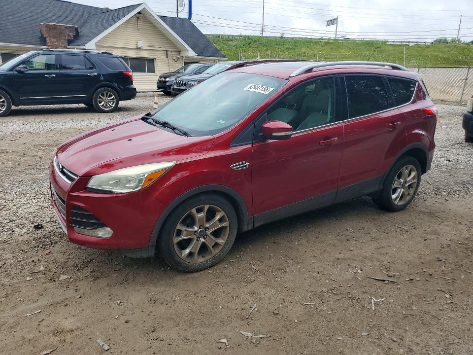 FORD ESCAPE 2014 with VIN 1FMCU0JX3EUB57899 - Photo from auction