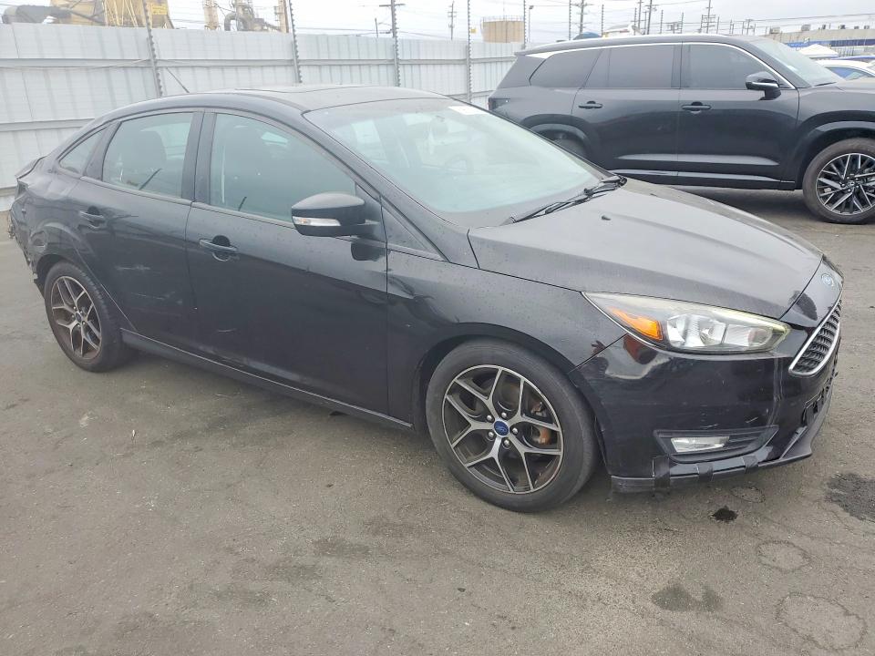 Photo 4 from auction – 2018 FORD FOCUS with VIN 1FADP3H2XJL227061