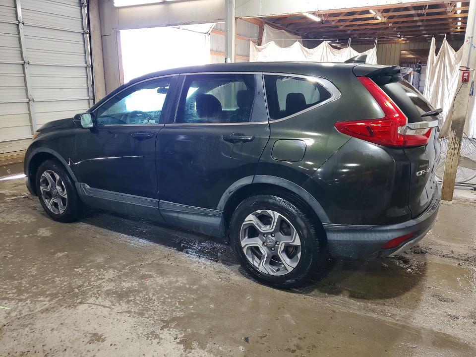 Photo 2 from auction – 2018 HONDA CR-V with VIN 7FARW2H58JE095500