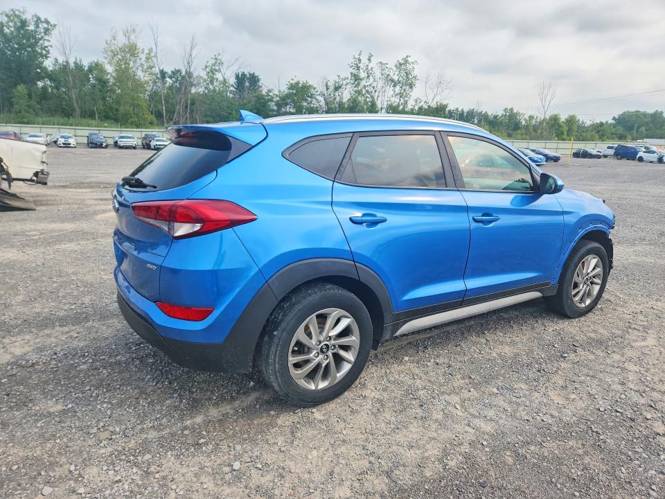 Photo 3 from auction – 2018 HYUNDAI TUCSON with VIN KM8J3CA44JU735004