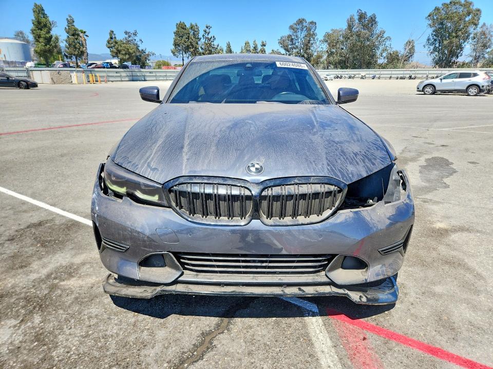 Photo 5 from auction – 2022 BMW 330I with VIN 3MW5R1J01N8C28759