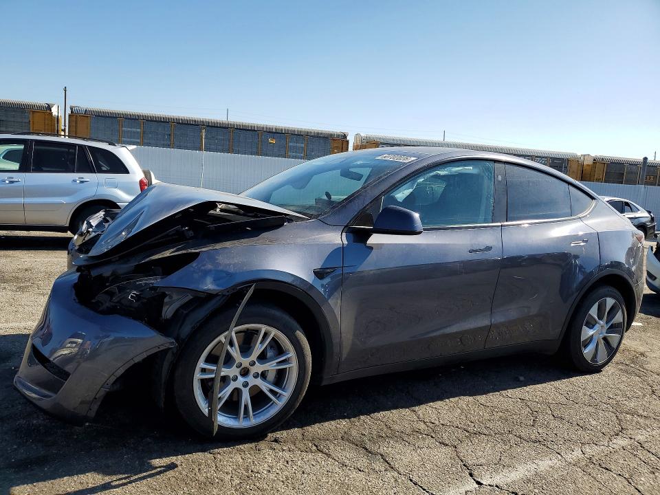 TESLA MODEL Y 2023 with VIN 7SAYGDEE0PA168372 - Photo from auction