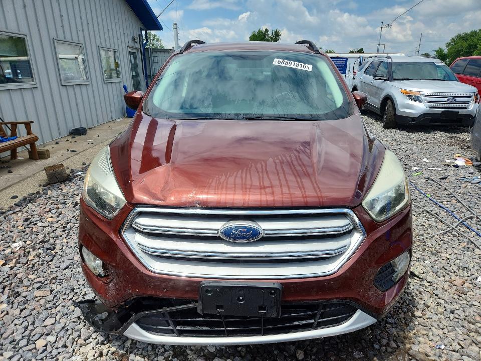Photo 5 from auction – 2018 FORD ESCAPE with VIN 1FMCU9GD0JUA04974