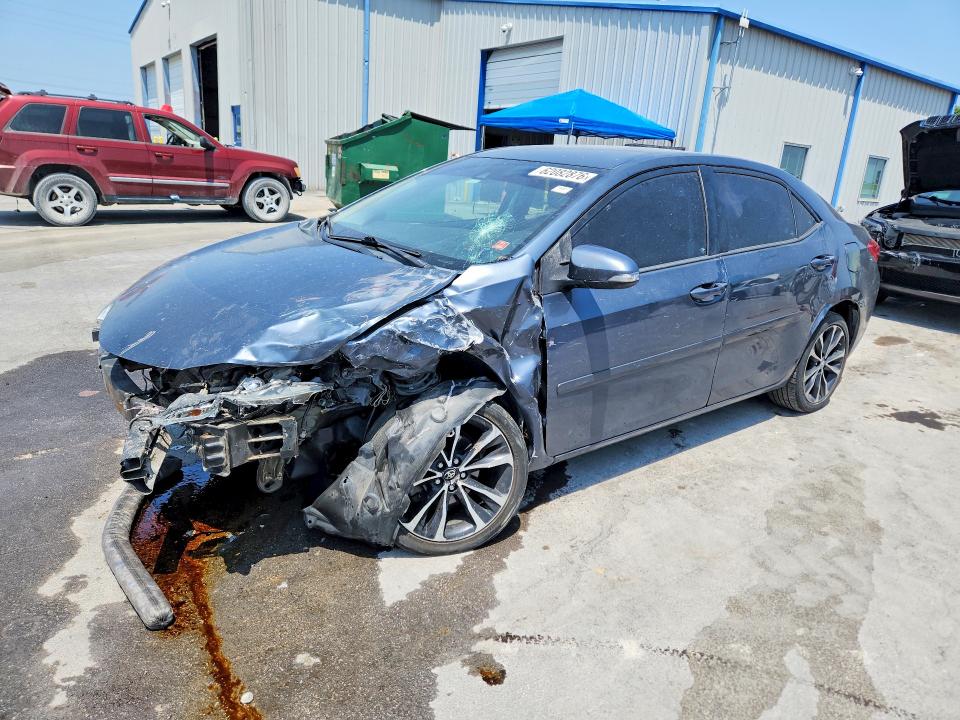 TOYOTA COROLLA 2017 with VIN 5YFBURHE4HP602239 - Photo from auction
