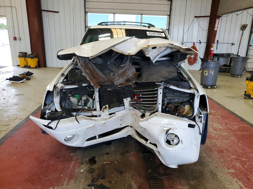 Photo 5 from auction – 2006 GMC ENVOY with VIN 1GKDT13S062229565