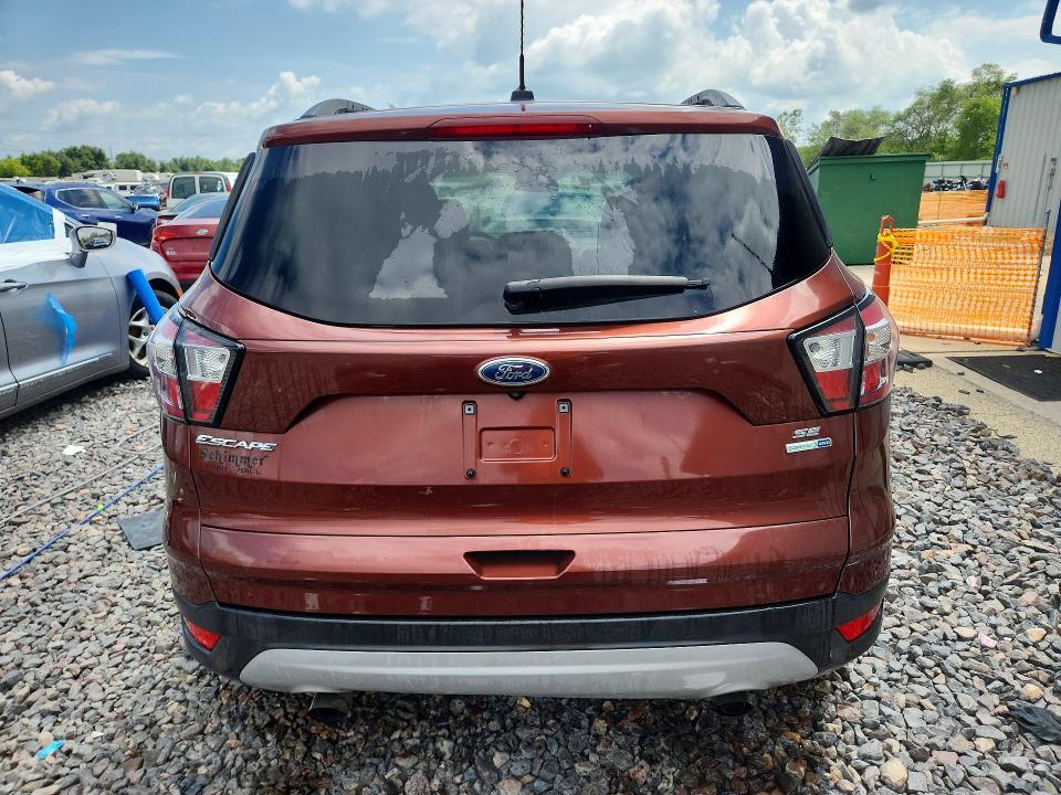 Photo 6 from auction – 2018 FORD ESCAPE with VIN 1FMCU9GD0JUA04974