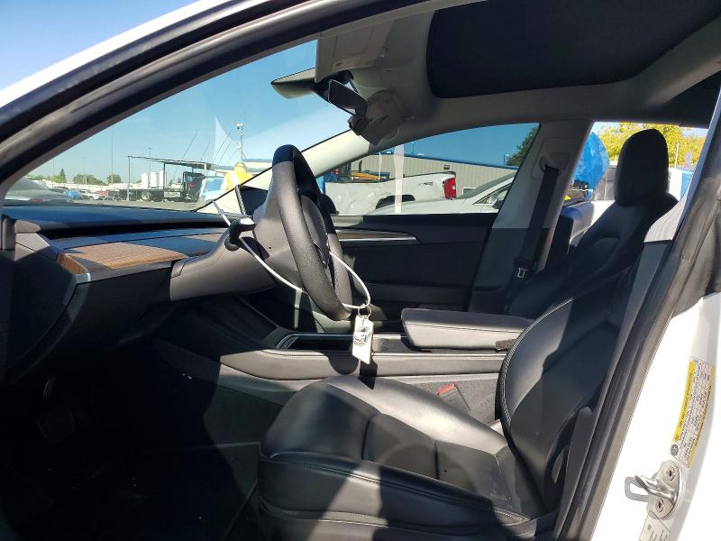 Снимка 7 от търг – 2021 TESLA MODEL 3 с VIN 5YJ3E1EB4MF019432