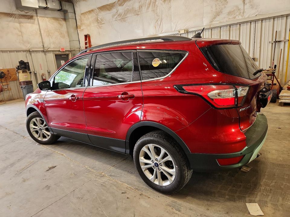 Photo 2 from auction – 2018 FORD ESCAPE with VIN 1FMCU9H91JUB57003