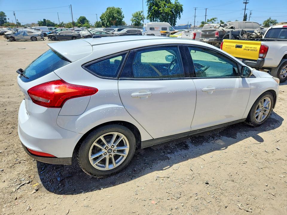 Photo 3 from auction – 2016 FORD FOCUS with VIN 1FADP3K27GL217539