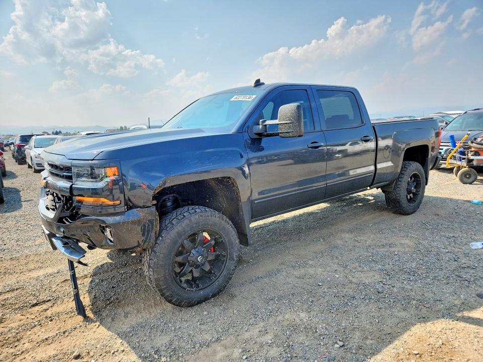 CHEVROLET SILVERADO 2018 with VIN 3GCUKREC0JG466074 - Photo from auction