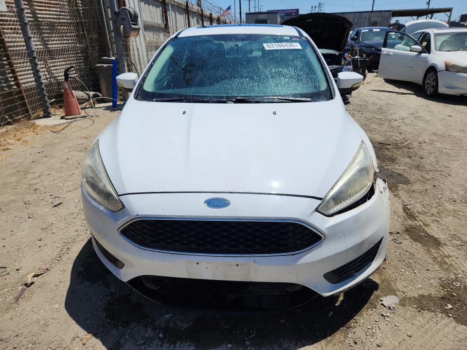 Photo 5 from auction – 2016 FORD FOCUS with VIN 1FADP3K27GL217539