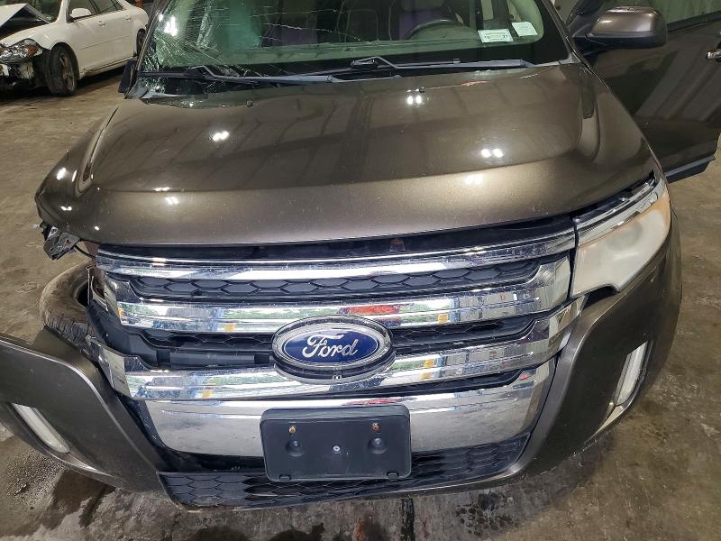 Photo 12 from auction – 2011 FORD EDGE with VIN 2FMDK4JC0BBA90906