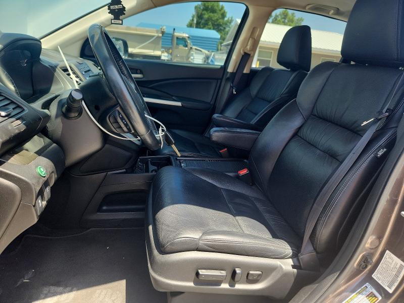Photo 7 from auction – 2014 HONDA CR -V with VIN 2HKRM3H77EH533228