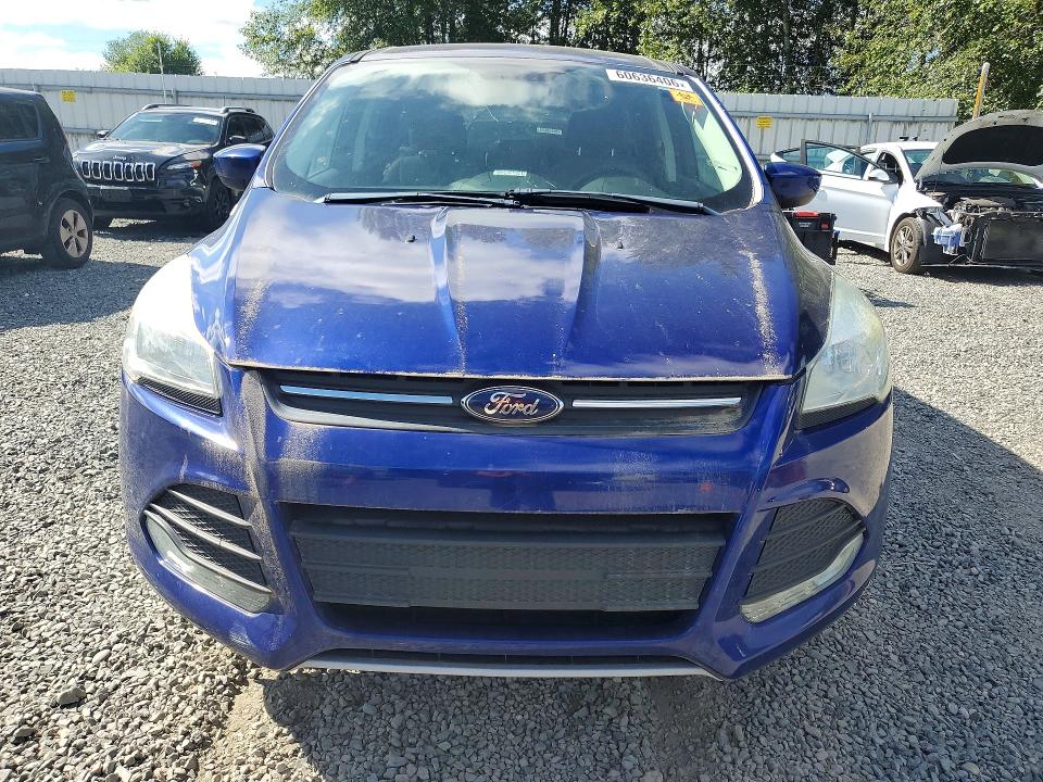 Foto 5 de la subasta – 2016 FORD ESCAPE con VIN 1FMCU9GX9GUC08689