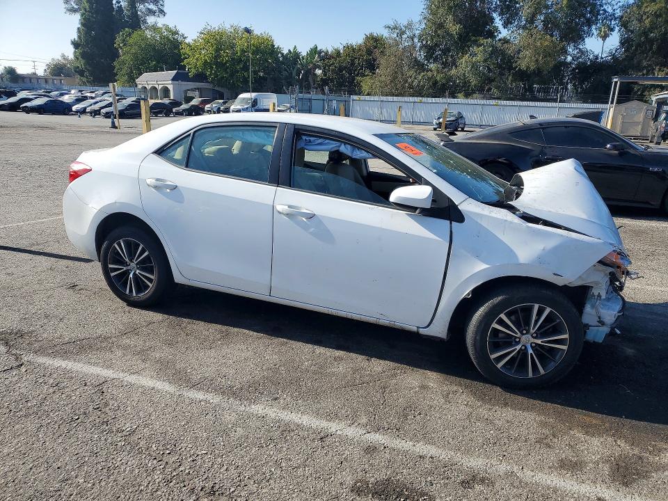Photo 4 from auction – 2017 TOYOTA COROLLA with VIN 5YFBURHE6HP652270