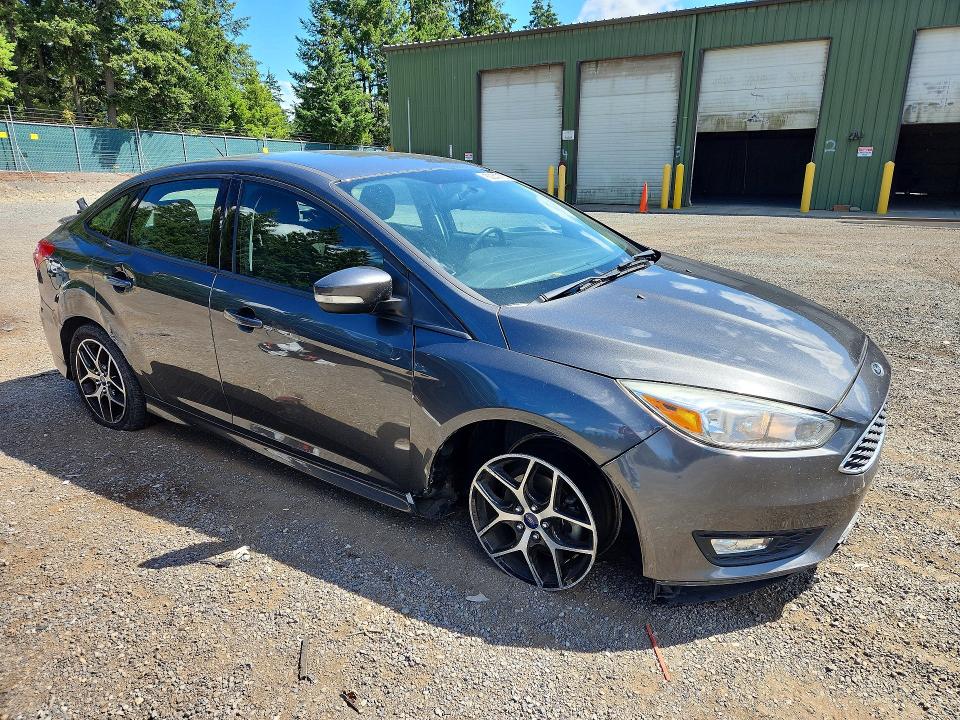 Photo 4 from auction – 2016 FORD FOCUS with VIN 1FADP3F28GL347016