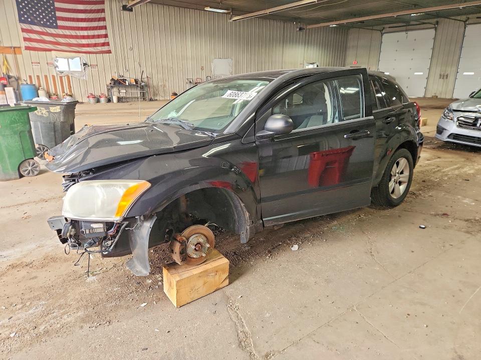 DODGE CALIBER 2010 with VIN 1B3CB4HA1AD562643 - Photo from auction