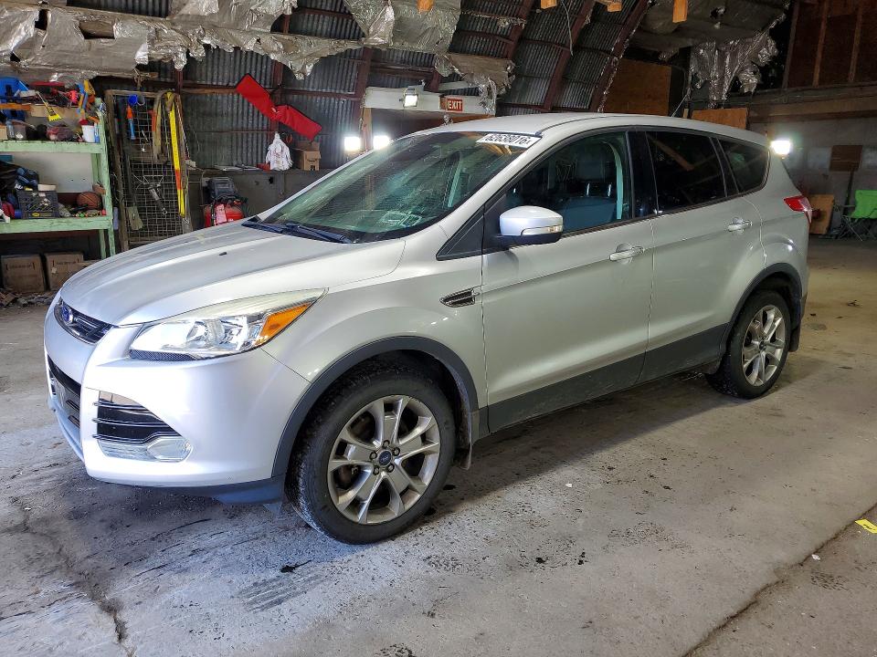 FORD ESCAPE 2013 with VIN 1FMCU9HX0DUB59585 - Photo from auction