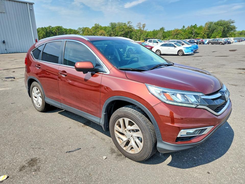Photo 4 from auction – 2015 HONDA CR-V with VIN 2HKRM3H73FH546401