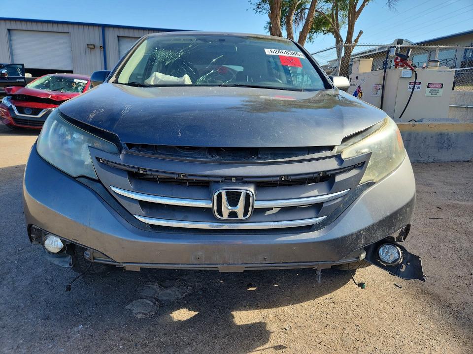 Photo 5 from auction – 2013 HONDA CR-V with VIN 2HKRM4H59DH671999