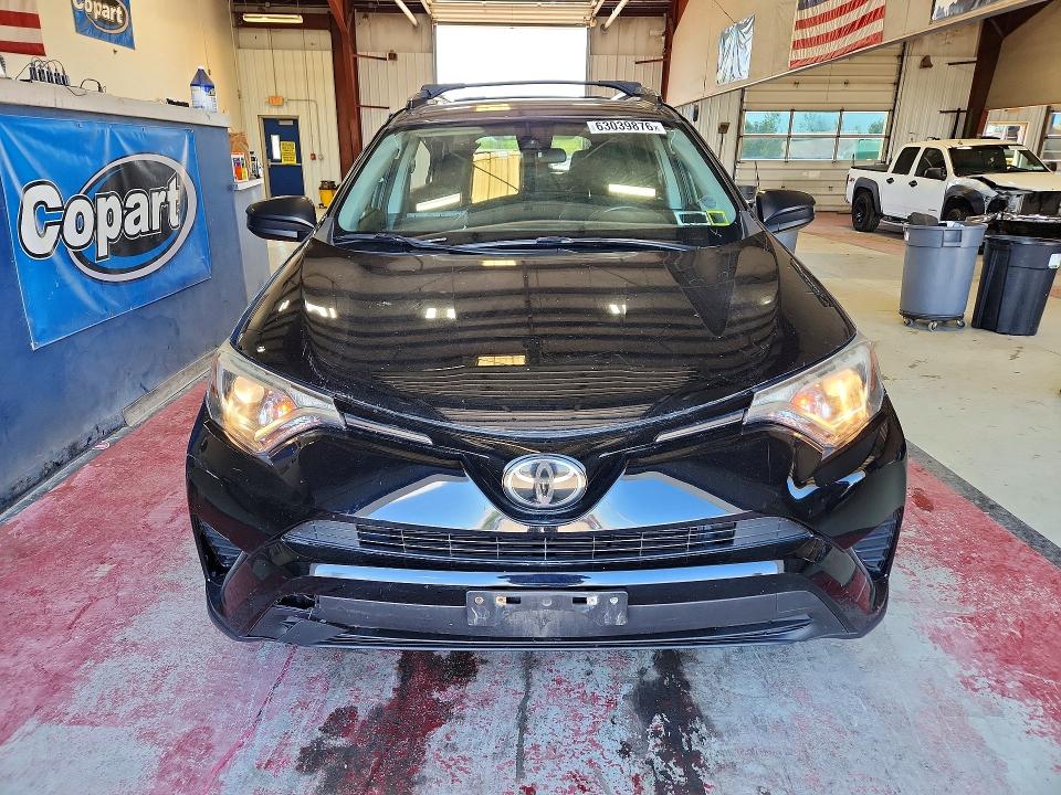 Photo 5 from auction – 2018 TOYOTA RAV4 with VIN 2T3BFREV5JW759675