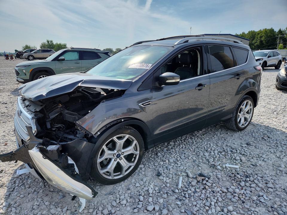 FORD ESCAPE 2018 with VIN 1FMCU0J97JUB66889 - Photo from auction