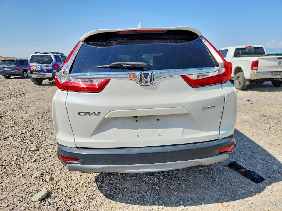 Photo 6 from auction – 2018 HONDA CR-V with VIN 2HKRW2H88JH615279